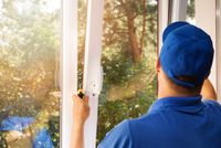 A person installing windows